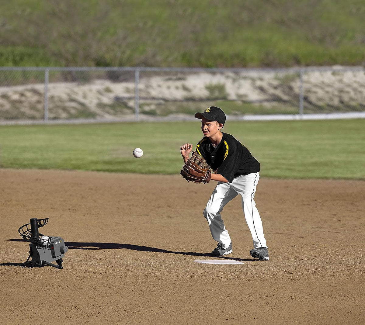 SKLZ Pitching Machine | Improve Your Swing | Ideal for Baseball & Softball Drills | Develops Hitting Power and